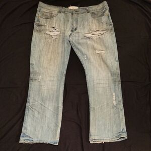 Relaxed Fit Distressed Jeans in Light Blue